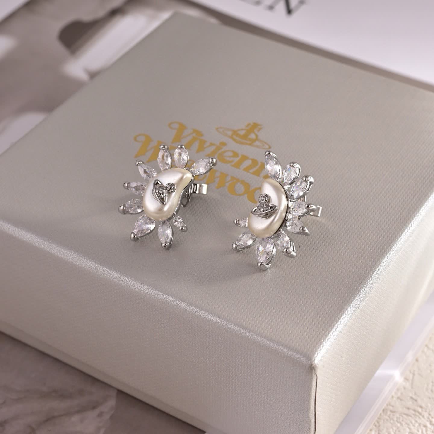 Vivienne Westwood Elegant Pearl and Diamond Stud Earrings